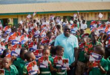 Kumawu MP donates exercise books to schools in constituency