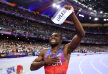 Lyles wins sensational 100m gold by 0.005 seconds