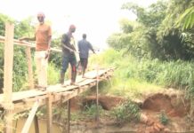 Ayuom residents protest over broken bridge; threaten to boycott December 7 polls