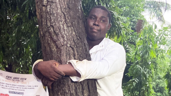 Abdul tree hugging