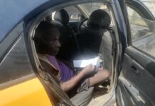 78-year-old man assisted to cast his ballot in a taxi