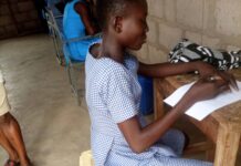 UER: Sirigu SHS students use yellow gallons as chairs during examination