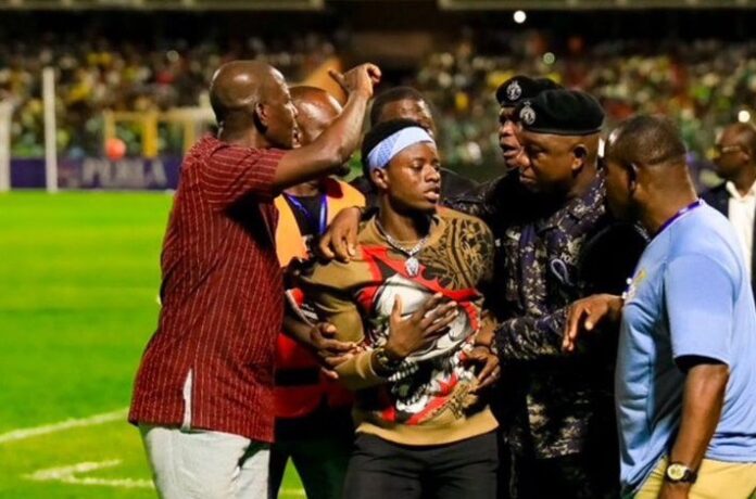 Pitch invader Ghana-Chad