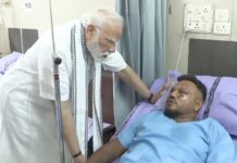 British survivor of Air India crash carries brother’s coffin after being discharged from hospital