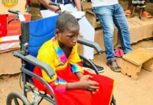 Physically challenged Akrokere D/A Primary pupil gets wheelchair from philanthropist