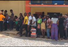 Photos: Ashanti regional post office overwhelmed as hundreds storm for security service forms