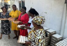 Dumelo supports school feeding caterers with food items to boost quality meals