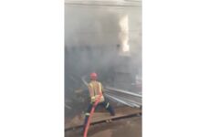 GNFS personnel douse Madina Zongo Junction fire