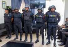 IGP promotes seven police officers for bravery in foiling Tema MoMo robbery