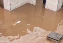 Inmates at Sekondi Central Prison spend long hours scooping floodwater from their cells