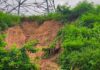 Foundation of high-voltage transmission pylon near Sekondi’s Albert Bosomtwi-Sam Fishing Harbour exposed by erosion