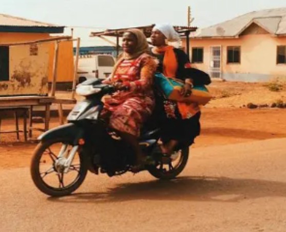 women riding motorbike